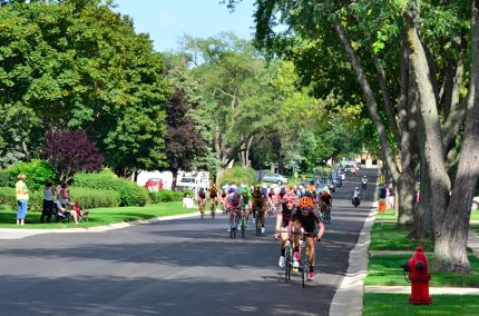 TOEG cyclists racing down Laurel Street