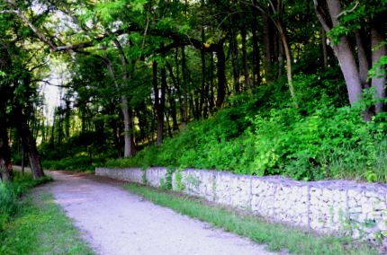 Stone wall along bike path