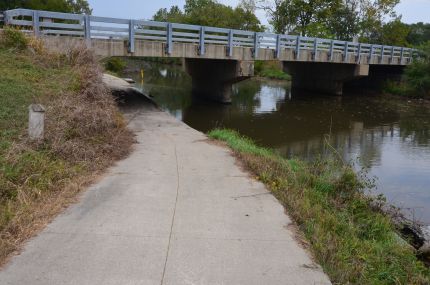 Hennepin Canal Trail cement surface passing under a road.
