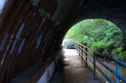 Railway tunnel and bike trail next to Oak Creek