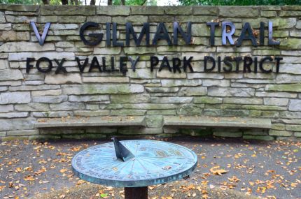 Sundial and V Gilman Trail sign