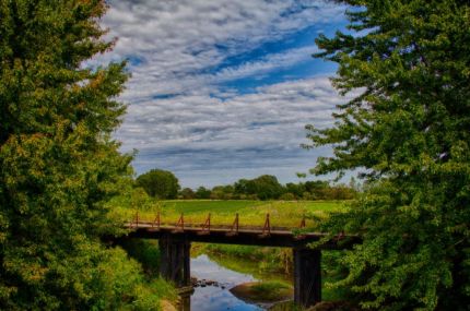 an HDR photo of bridge on Wauponsee Glacial Trail