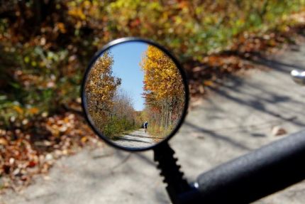 Bike mirror and fall colors on canal trail