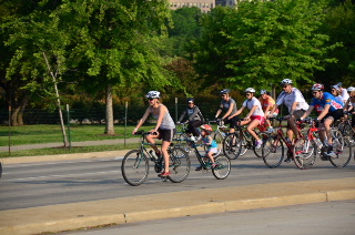 Woman and child bike riders ahead of the pack