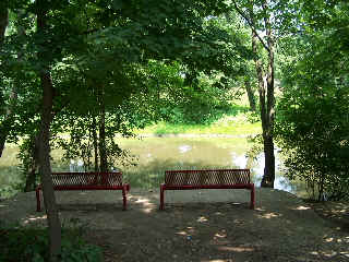 The red benches near bike trail and Adler Park