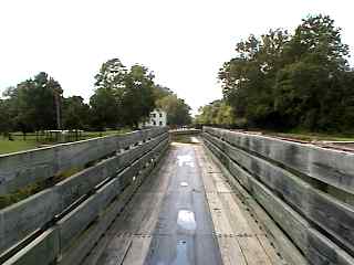 long wooden bike trail bridge