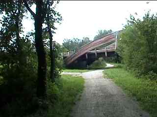 Old wooden highway bridge as seen from bike trail